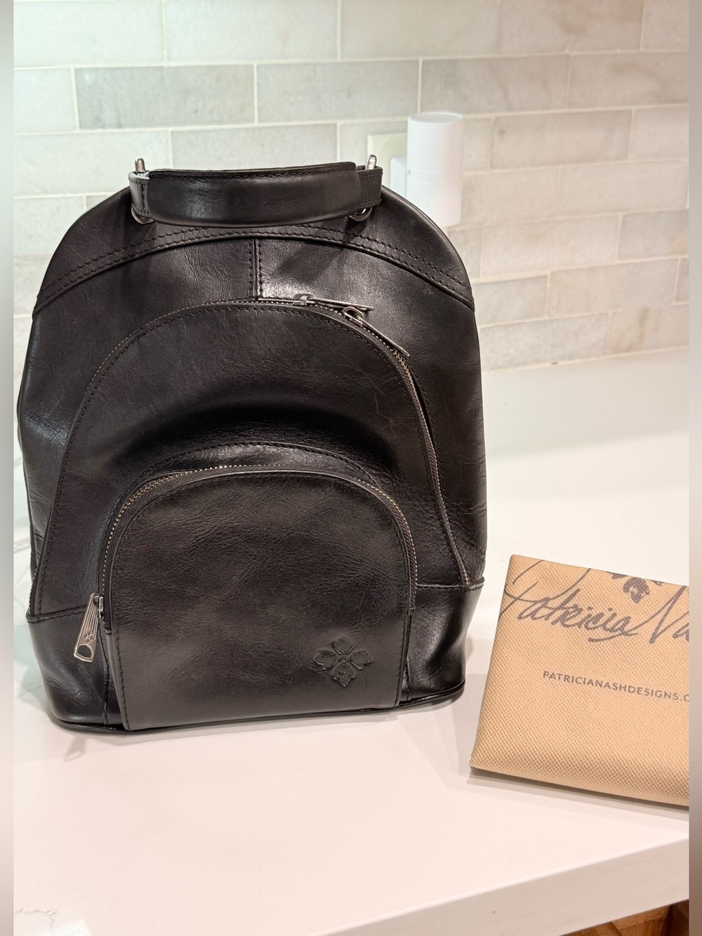 Patricia Nash Leather Convertible Backpack / Crossbody Bag (includes dust bag)